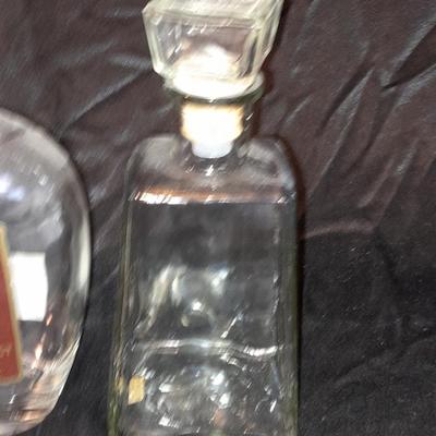 Empty Alcohol bottles with stoppers make wonderful vases!