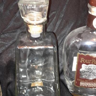 Empty Alcohol bottles with stoppers make wonderful vases!