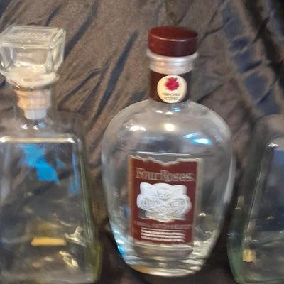 Empty Alcohol bottles with stoppers make wonderful vases!