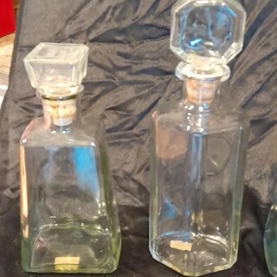 Empty Alcohol bottles with stoppers make wonderful vases!