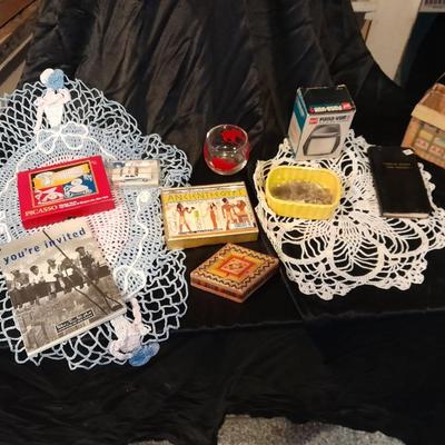 Decks of collectable cards, Dish full of Mica, and an assortment of trinkets and treasures