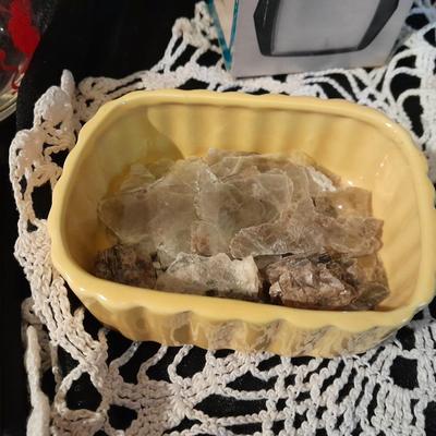 Decks of collectable cards, Dish full of Mica, and an assortment of trinkets and treasures