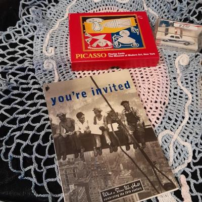 Decks of collectable cards, Dish full of Mica, and an assortment of trinkets and treasures