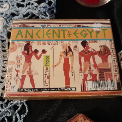 Decks of collectable cards, Dish full of Mica, and an assortment of trinkets and treasures