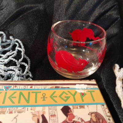 Decks of collectable cards, Dish full of Mica, and an assortment of trinkets and treasures