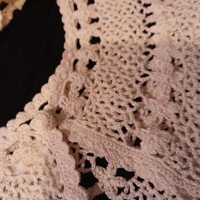 Vintage hand knit collars and a pair of white gloves.