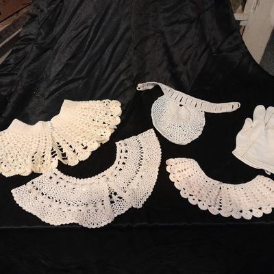 Vintage hand knit collars and a pair of white gloves.