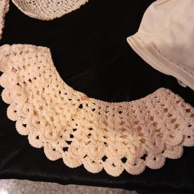 Vintage hand knit collars and a pair of white gloves.