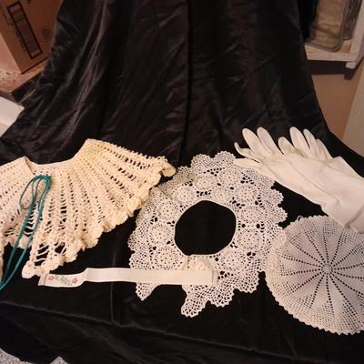 Vintage hand knitted collars and doily and a pair of white gloves