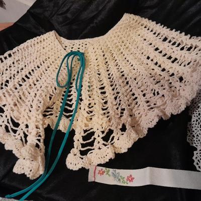 Vintage hand knitted collars and doily and a pair of white gloves