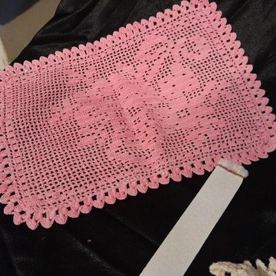 Vintage hand knitted collar, two pink rectangle doily's, and a pair of white gloves