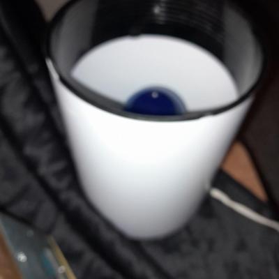 Wall mount Brass Lamp with shade, a free standing can light, and small candle light