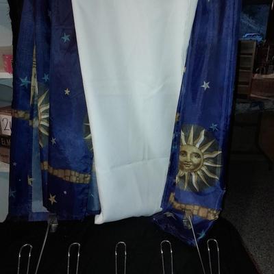 Celestial Shower curtains, and a white shower curtain with over the door hanger