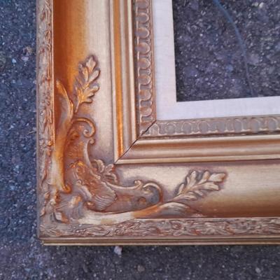Beautiful Gold toned 12 x 16" vintage picture frame with carved design