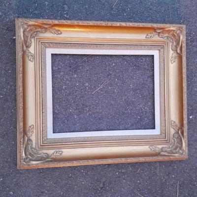 Beautiful Gold toned 12 x 16" vintage picture frame with carved design