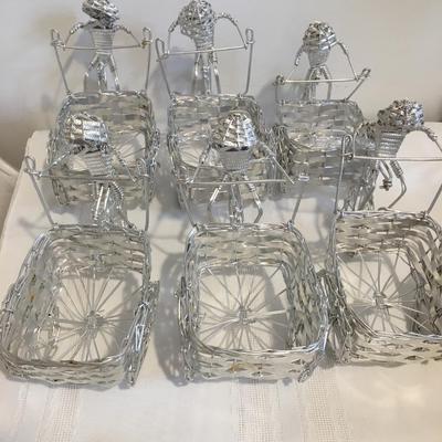6 woven metal bicycles pulling baskets