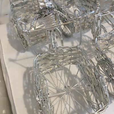 6 woven metal bicycles pulling baskets
