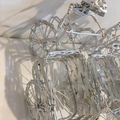 6 woven metal bicycles pulling baskets