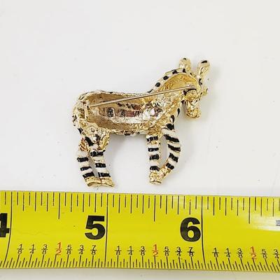 GOLD TONED ZEBRA PIN