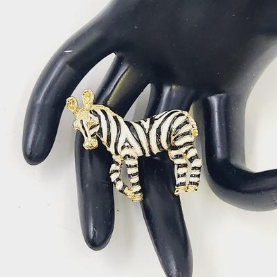 GOLD TONED ZEBRA PIN