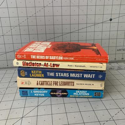 #293 The Stars Must Wait, The Heirs of Babylon and More Paperback Books