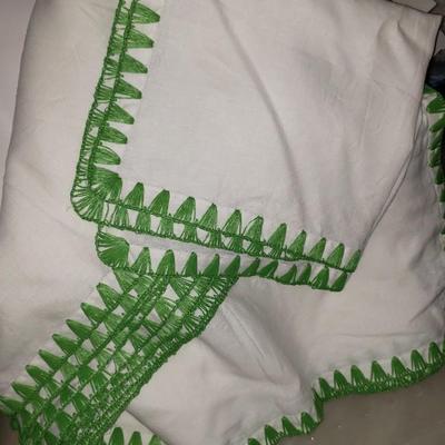 12 large napkins by Kim Seybert with knotted edges in green 21" square