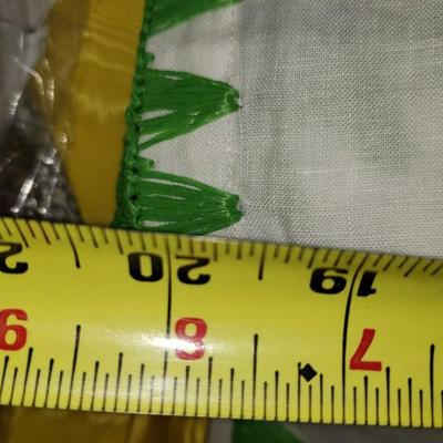 12 large napkins by Kim Seybert with knotted edges in green 21" square