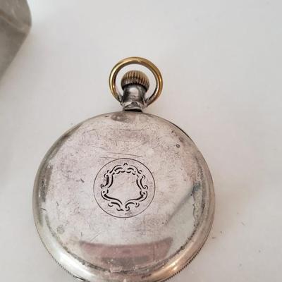 Silver and glass inkwell with calendar and clock