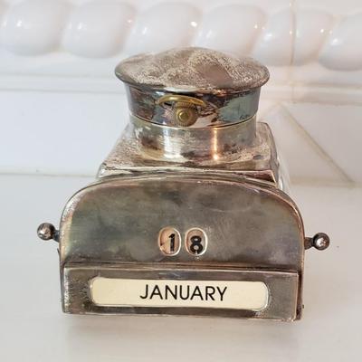 Silver and glass inkwell with calendar and clock