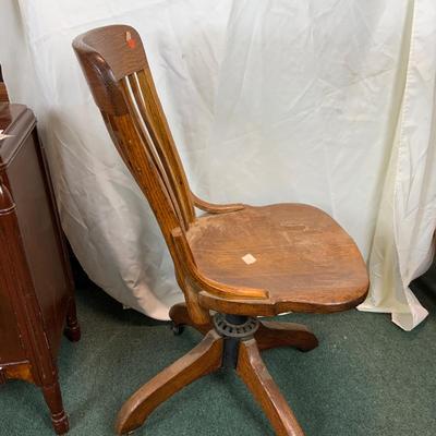 Lot 212 | Armless Oak Swivel Office Chair