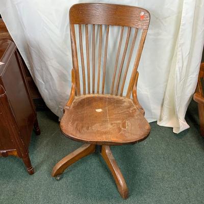 Lot 212 | Armless Oak Swivel Office Chair