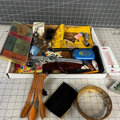 Junk Drawer Clean out: Paper Weight, Knife sheath, Bank Bag, Super Ball 