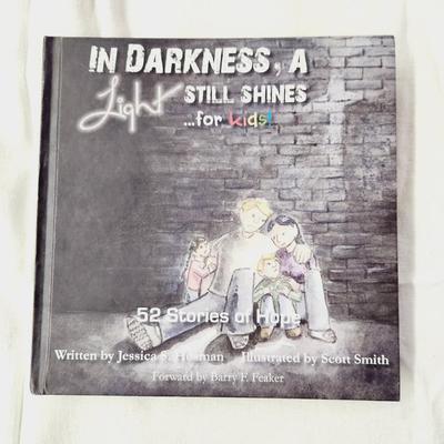 IN DARKNESS A LIGHT STILL SHINES FOR KIDS HARDBACK BOOK