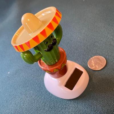 SOLAR ROCKER SOMBRERO WEARING CACTUS ARMS ROCK!