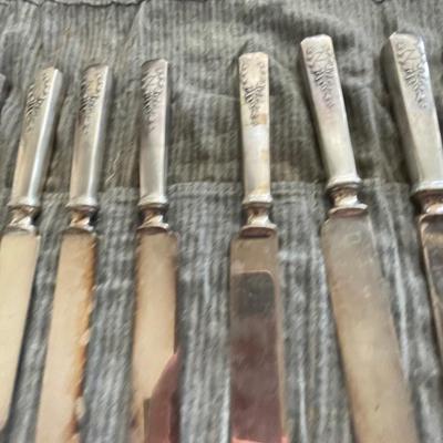 EIGHT STERLING SILVER KNIVES