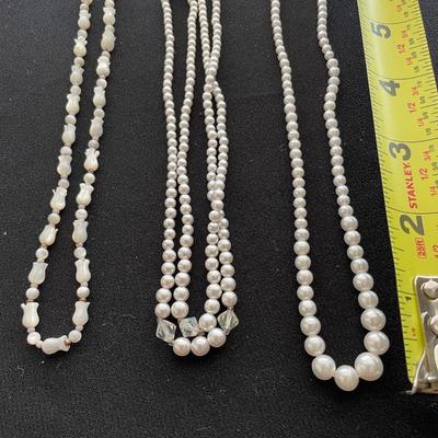 THREE FAUX PEARL NECKLACES WITH BROOCH