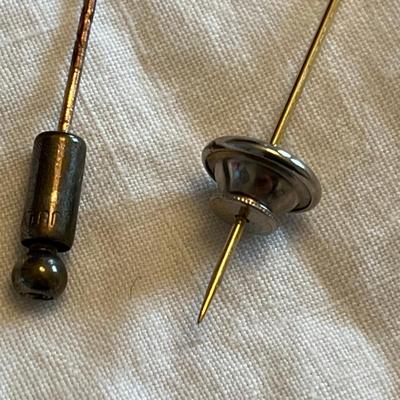 Two Gold Stick Pins