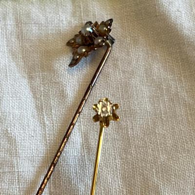 Two Gold Stick Pins