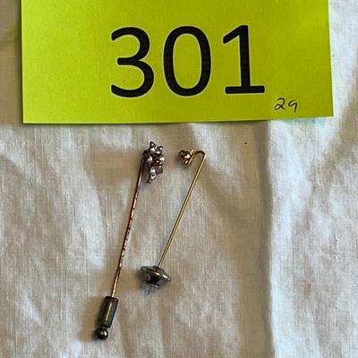 Two Gold Stick Pins