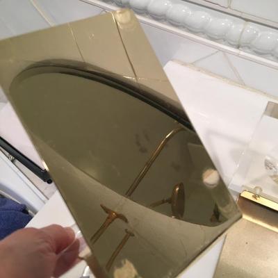 Vintage lucite and brass bookends