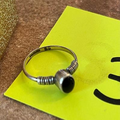 Lot of 4 Sterling Rings, some with stones.
