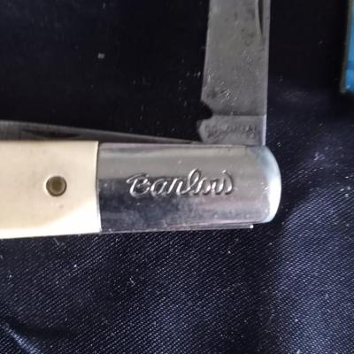 POCKET KNIVES AND BUTANE LIGHTERS