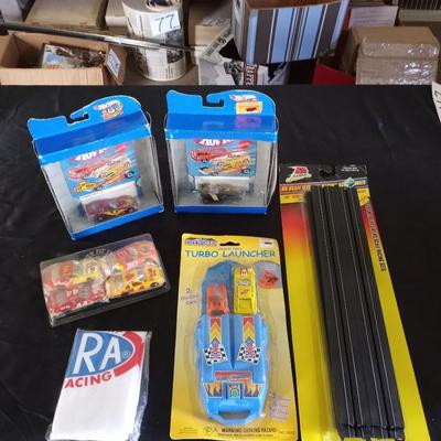 HOT WHEELS AND OTHER RACING CARS- TRACKS AND RACING SHIRT