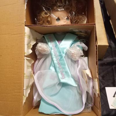 PRECIOUS MOMENTS PORCELIAN DOLL WITH AUTHENTICITY CERTIFICATEQ