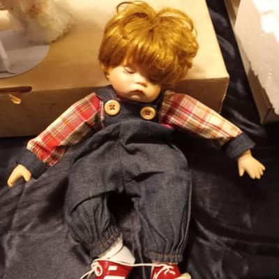 TWO GIRL AND BOY PORCELIAN DOLLS