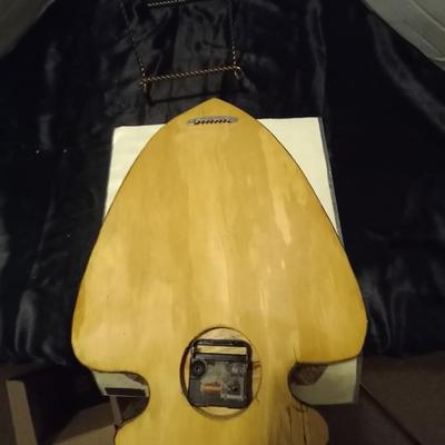SIGNED SKETCH AND WOOD LAQUERED CLOCK