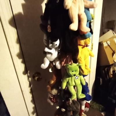 TY BEANIE BABIES HUNG ON WOODEN POLE STAND