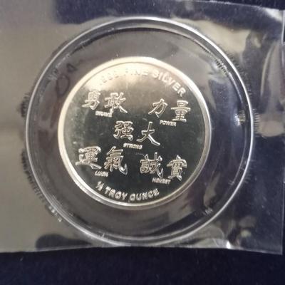 TWO ,999 FINE SILVER 1/2 TROY OUNCE EACH COINS