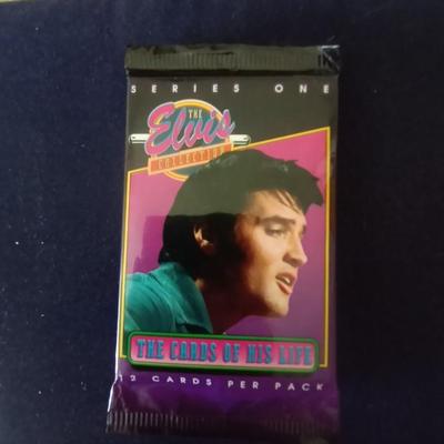 FOUR SEALED PACKS OF ELVIS TRADING CARDS