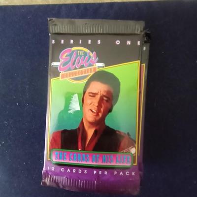 FOUR SEALED PACKS OF ELVIS TRADING CARDS